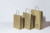Papiertragetaschen Gold 22+10x31cm Kraft 90 Gramm (50 Stück) [PAM2231GO]